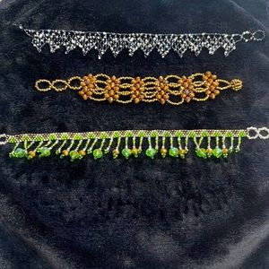 Three hand beaded bracelets adjustable
